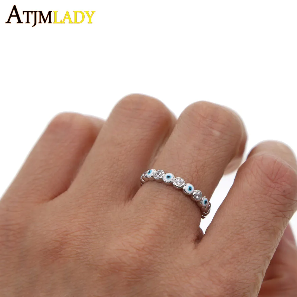 Женское кольцо с микро покрытием серебряное мелким глазом синего черного цвета