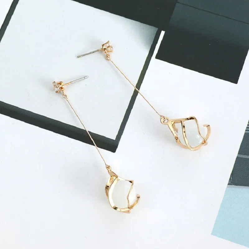 Новая мода опал кисточкой серьги личности полые простые безумные Сережки для