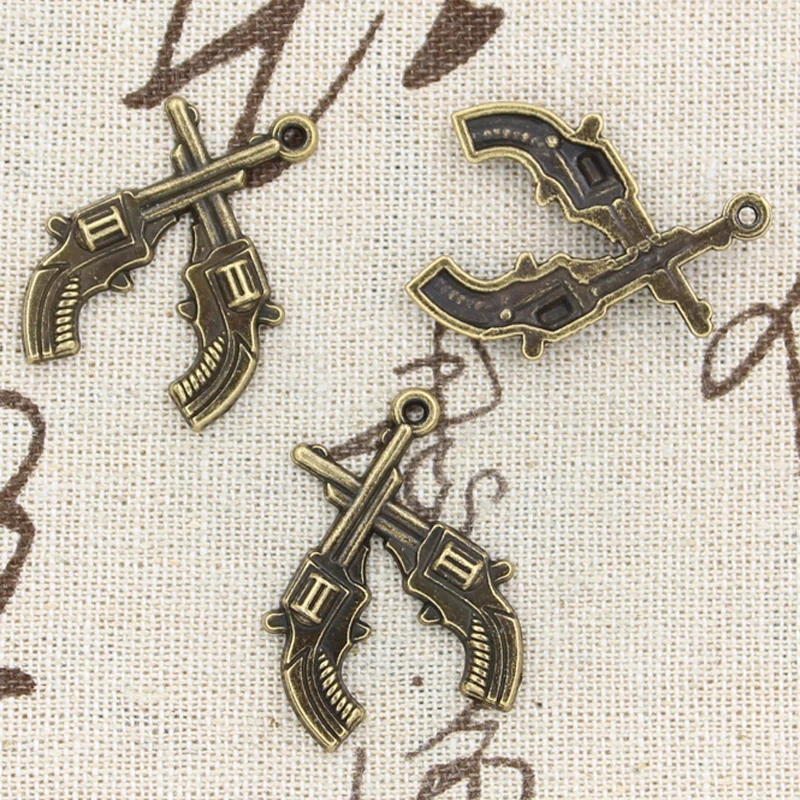 10 штук подвесок "Перекрестные пистолеты-револьверы" западного стиля 31x23 мм Античное серебро и бронза, изготовление украшений тибетского стиля своими руками.