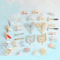 minimalism color jewelry medical brooches collection crystal uterus microscope scalpel stomach tooth pins for doctor nurse