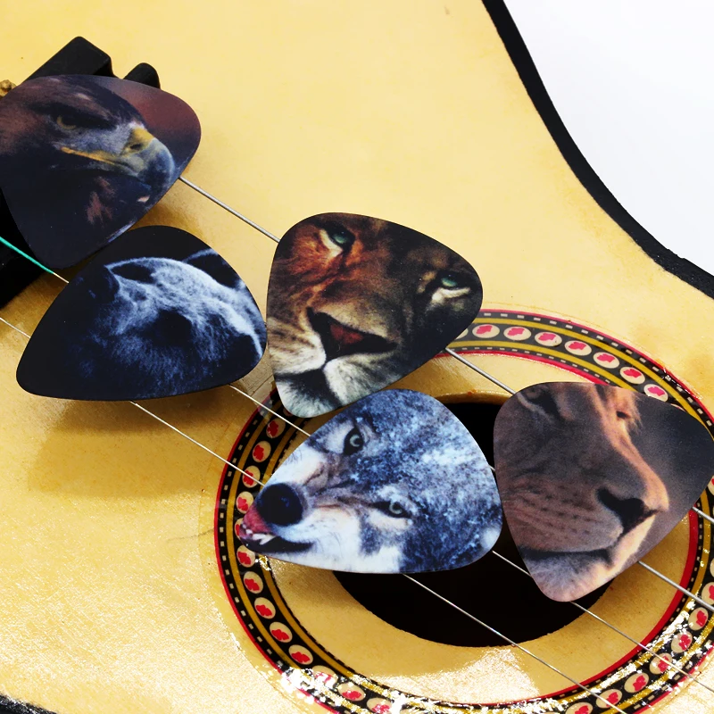 

100pcs Thickness 1.0mm 0.46 0.71Guitar Picks Two Side Earrings Pick DIY Design Guitar Accessories Tiger Pick Guitar Strap 1T5-14