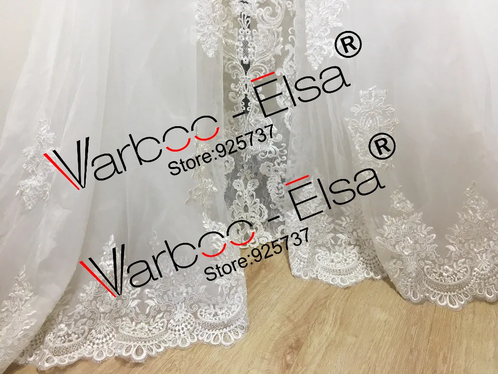 Свадебное платье с открытыми плечами коротким рукавом и аппликацией из жемчуга |