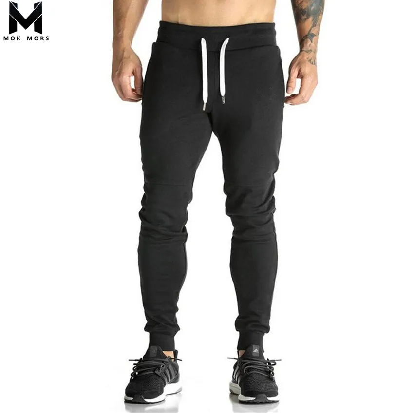 

2020 Men Full Crand Sportswear Pants Casual Elastic Cotton Mens Fitness Workout Pants Skinny Sweatpants Trousers joggers Pants