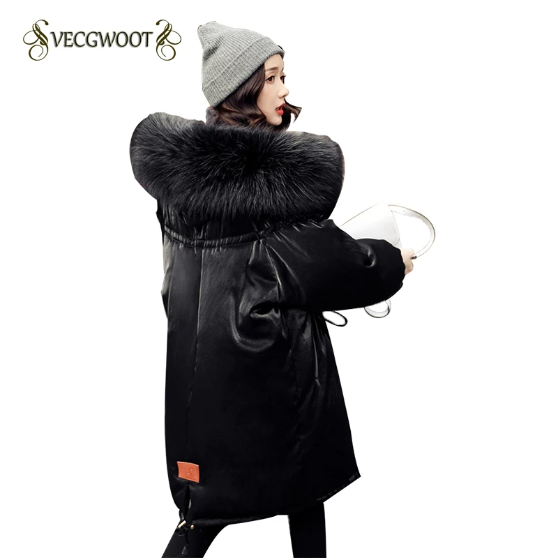 Женский пуховик средней длины зимний свободный большого размера с большим