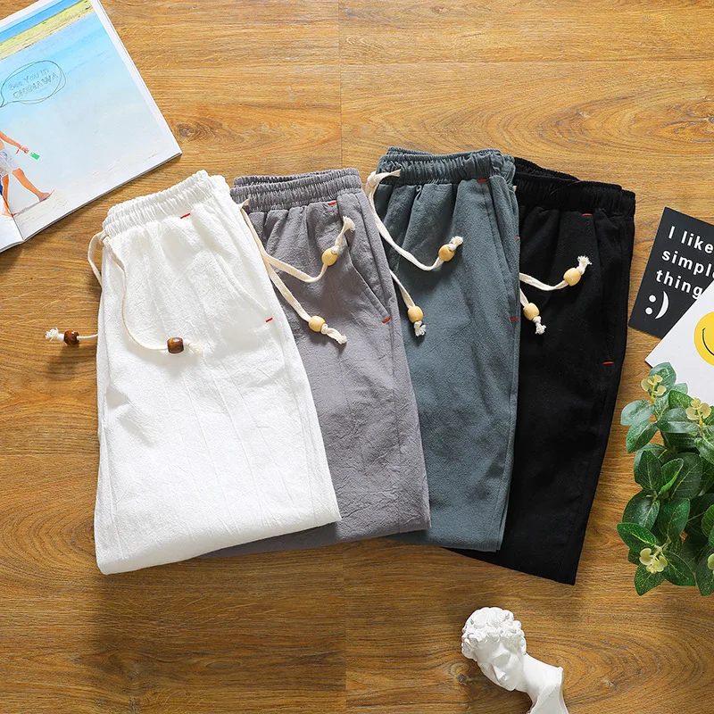 Мужские повседневные шорты из хлопка и льна черные белые свободные с завязками