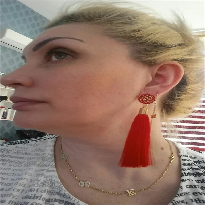 Модные полые солнце кисточкой серьги Boho чешского долго преувеличены перо крыло