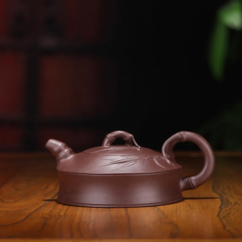 

Yixing recommended undressed ore famous purple clay teapot all hand-made plate of 210 ml bamboo pot of tea is special
