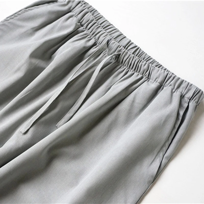 

Plain color man and woman spring autumn couple pajamas cotton and linen women long-sleeved cardigan home service suit ladies