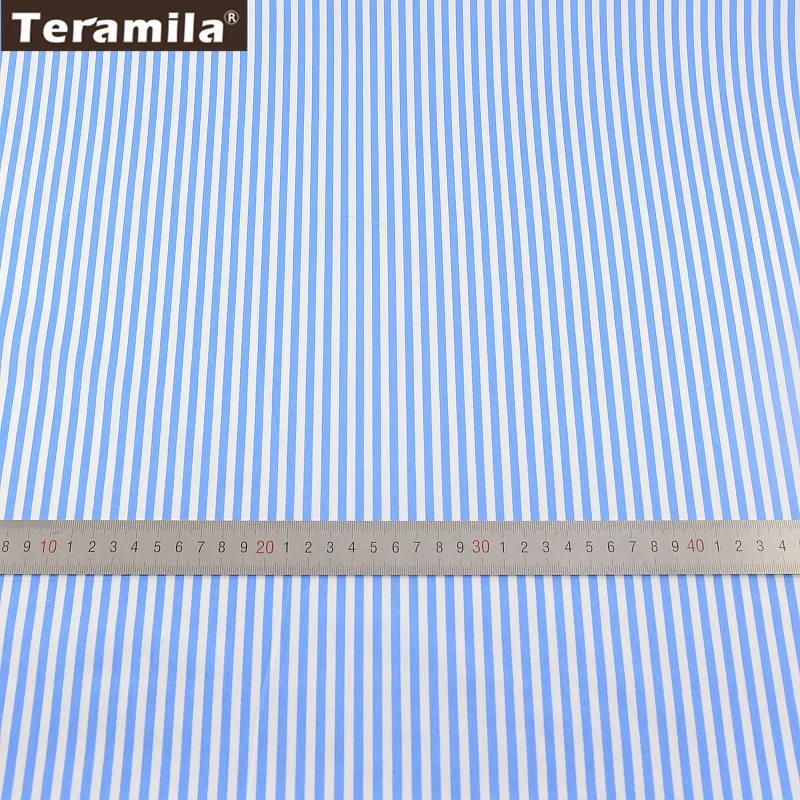 Хлопчатобумажная ткань с принтом в синюю полоску саржевая четверть жира