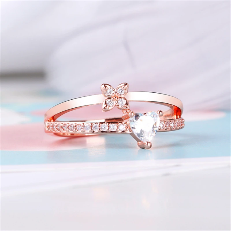 Женское свадебное кольцо с белым фианитом сердцем четырьмя листьями