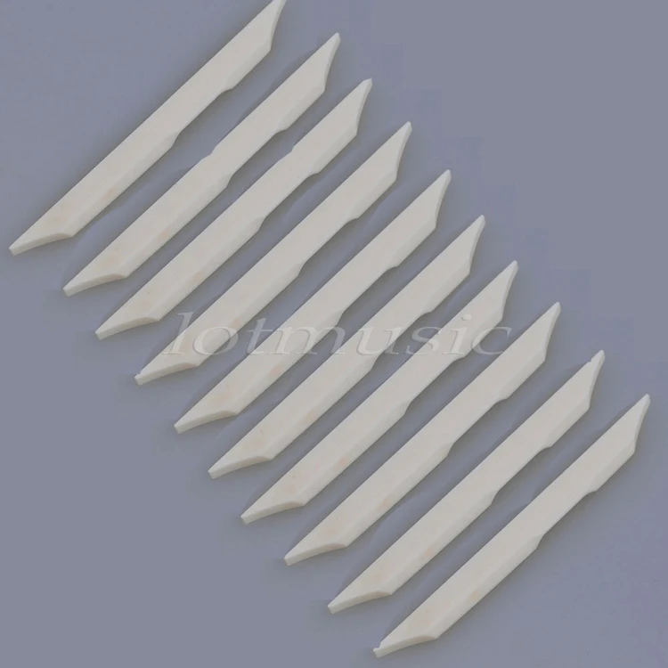 

Ukulele Saddle Guitar Saddle Bone for 4 String Ukulele Guitar Parts Accessories Buffalo Bone 79mm 10 Pcs