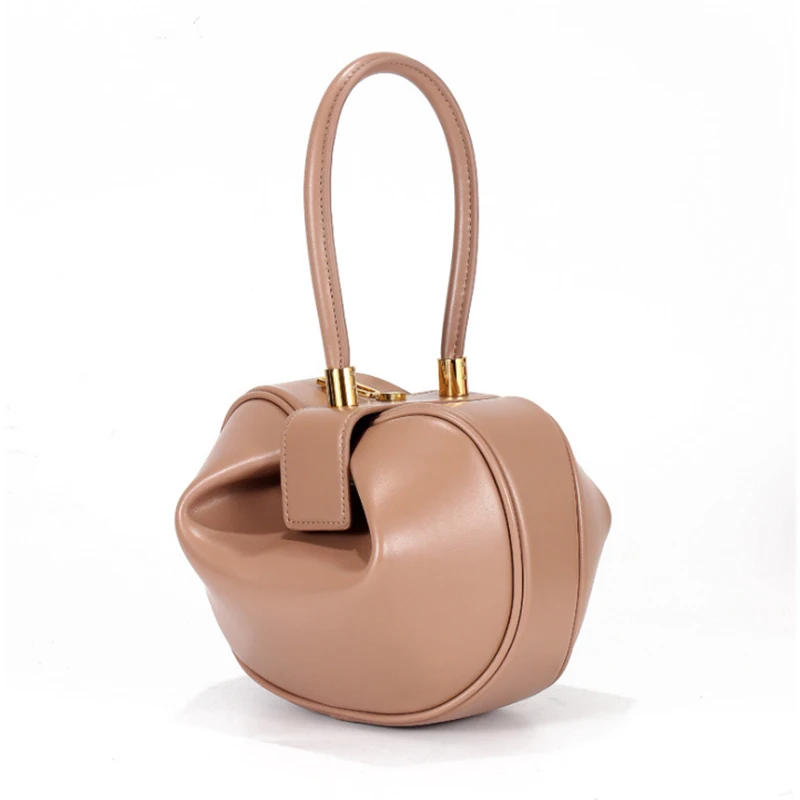 

Bag female leather handbags Europe and the United States fashion retro French niche design portable dumplings wonton handbags