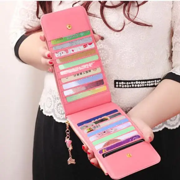 Длинный женский кожаный бумажник с бантиком от известного дизайнера держатель