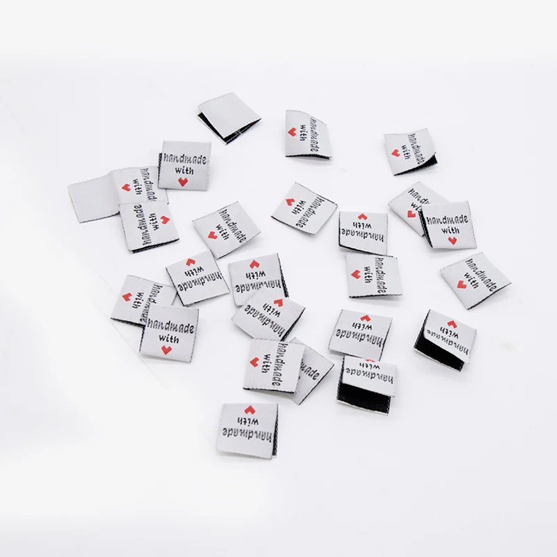 150 шт. в наличии этикетки для одежды черные письма ручной работы с сердечным