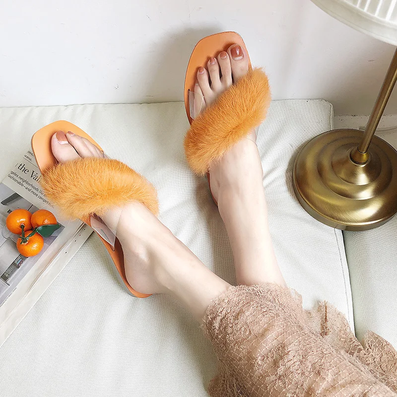 

Cross fur slippers female 2019 new Korean version of the summer flat transparent word drag wild wear sandals