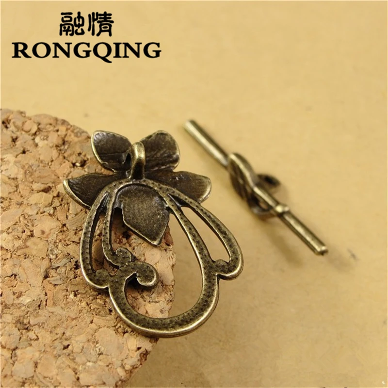 

RONGQING 60Sets/lot 29*20MM Flower Shaped Circle Hook Clasps Unique Flower Connectors Clasps Bronze for Jewelry Making