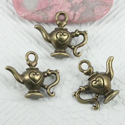 

16pcs antiqued bronze color 2sided pattern heart teapot charms EF0909