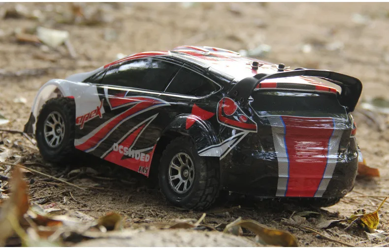 Wltoys A949 гоночный автомобиль 2,4 ГГц 4WD Управление игрушки дистанционного Управление автомобилем 1:18 высокого Скорость 40 км/ч RC Автомобиль Электронные Автомобильные a959