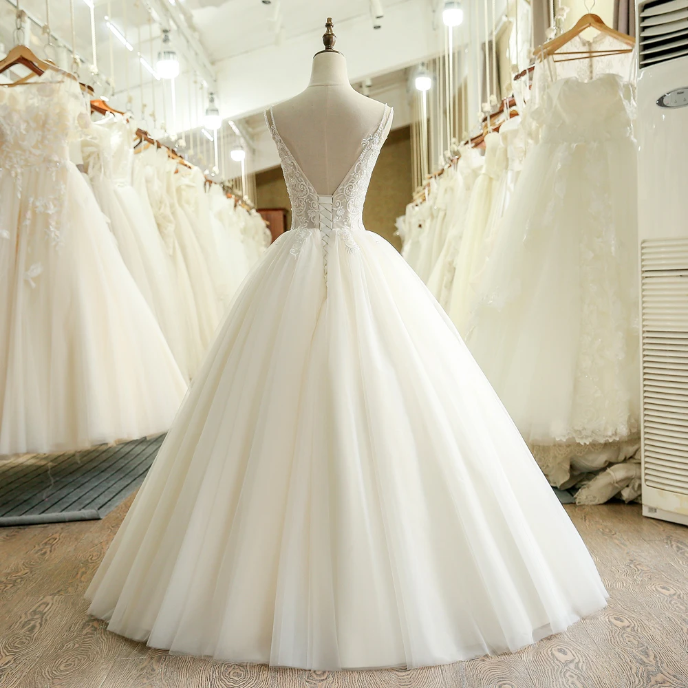 Винтажное свадебное платье из тюля трапециевидной формы с кружевной аппликацией