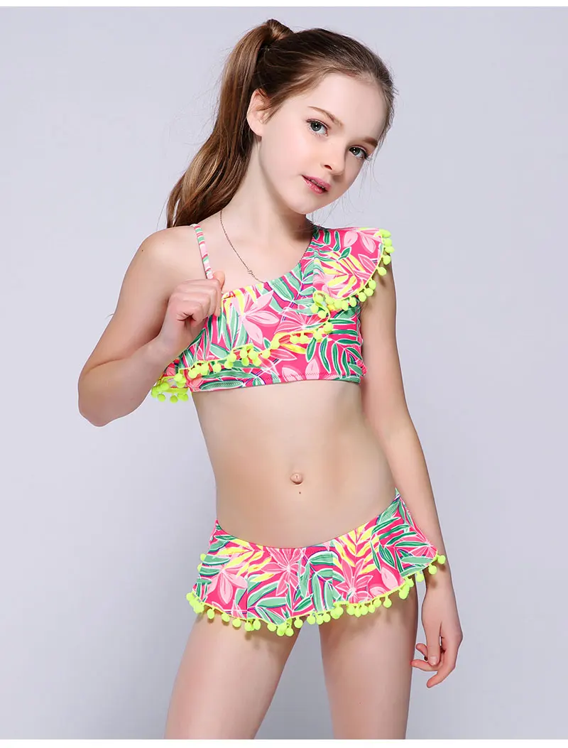 Andzelika bikini бикини для девочки. Раздельный яркий купальник с топом на одно плече с рюшами и плавки с юбкой