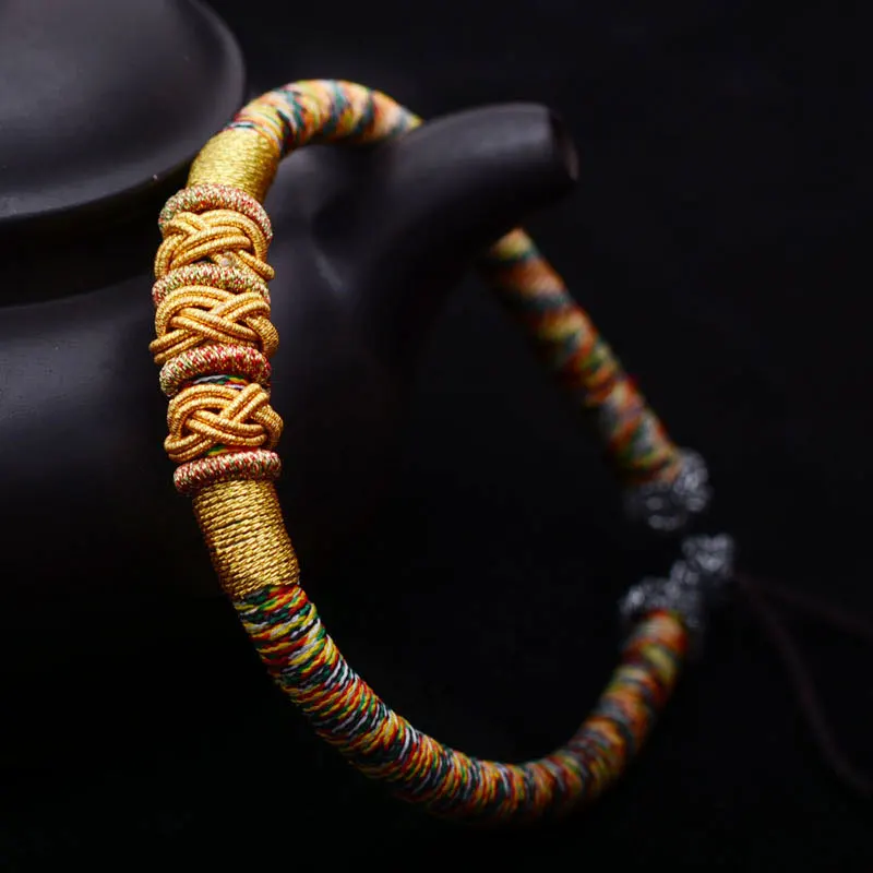 

Simple Five-color Streamer National Wind Tibetan Style Multicolored Chinese Knot Hand Rope Braid Bracelet Female Hot Sale