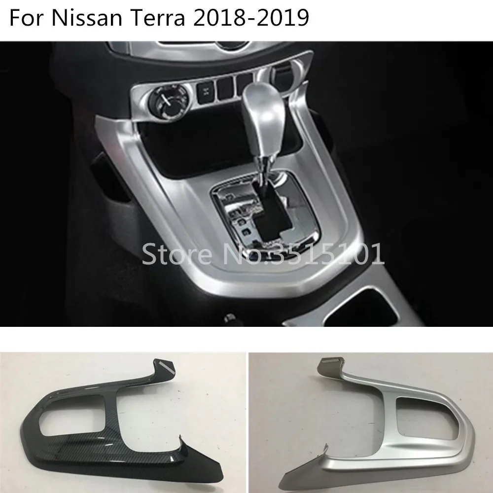 

Car Stick ABS Matte / Carbon Fibre Middle Front Shift Stall Paddles Cup Lamp Frame Trim 1pcs For Nissan Terra 2018 2019 2020