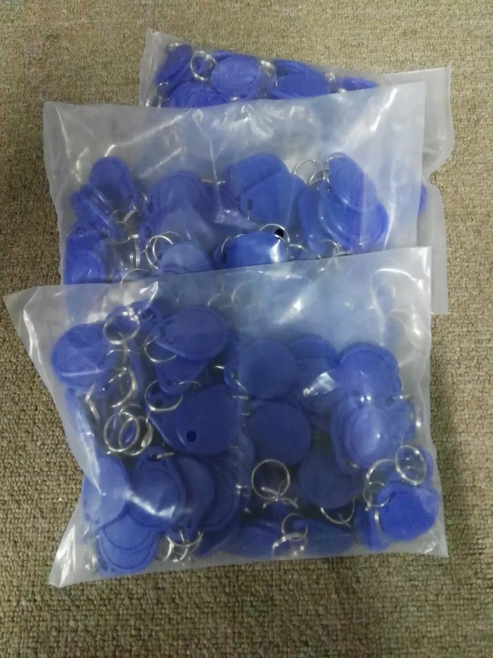 DWE CC RF 100 шт. в партии abs пассивный rfid id 125 кГц записываемый брелок для ключей 5200 чип перезаписываемый брелок