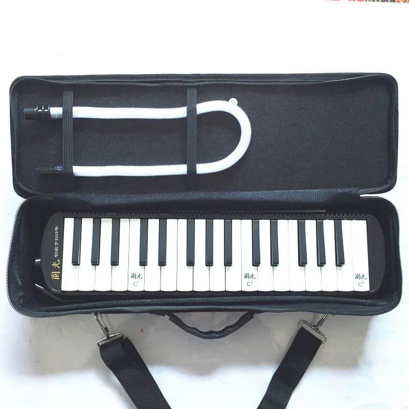 

32 keyboard, mouth organ, Guoguang, harmonica, organ performance, blowing, mouth blowing and blowing.