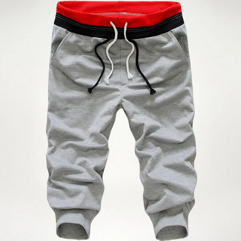 

Newly Fashion Men Pants Solid Color Elastic Sweatpants Three Quarter Troursers Boys Casual Beach Pants m99