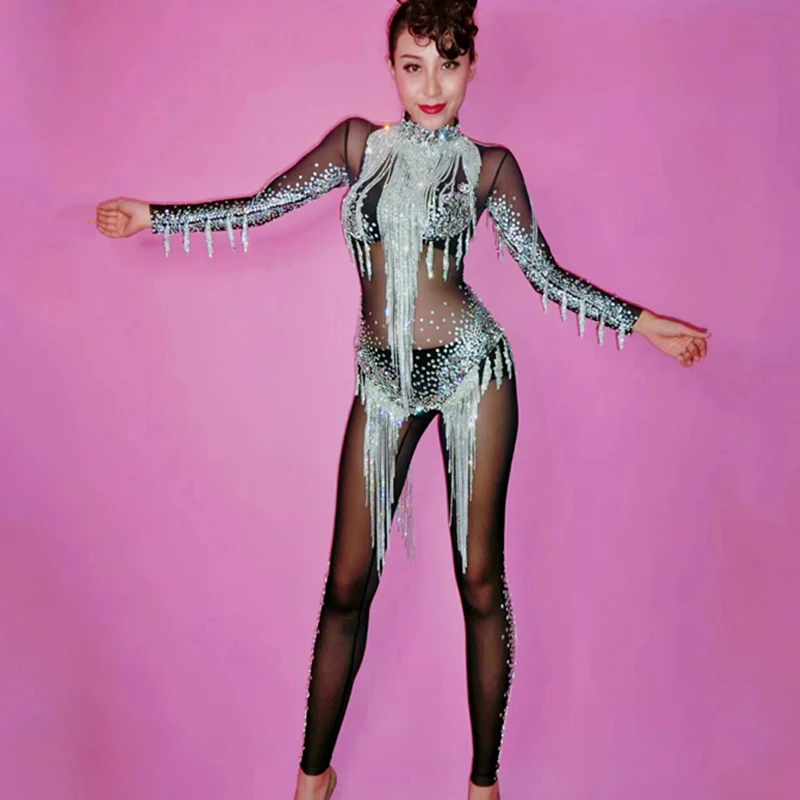 Ярко-серебристый комбинезон со стразами и кисточками черный сетчатый с