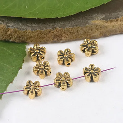 

100pcs dark gold-tone plum flower spacer beads h2136
