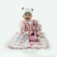 new bebe reborn silicone baby doll smile baby childrens toys magnet pacifier 22 inch 55 cm lovely pink baby bear doll