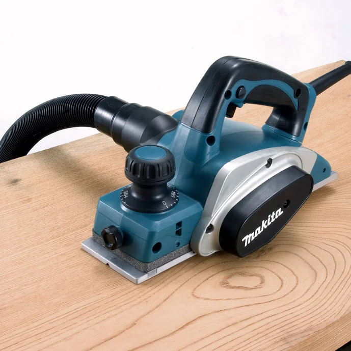 Makita KP0800X 620 Вт ширина строгания: 82 мм(3-1/") глубина: 2,5 мм(3/32") 17000 об/мин ручной Электрический строгальный станок