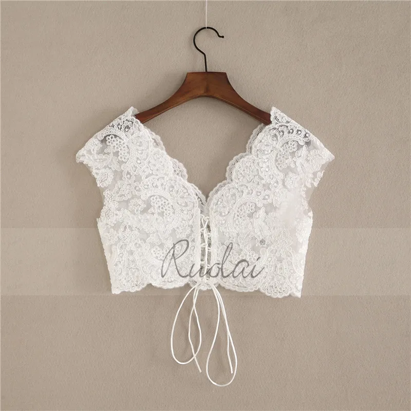 Женское свадебное болеро цвета слоновой кости/белого кружевное со шнуровкой на