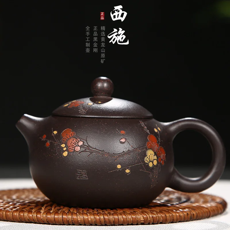 

is a small tea pot with hand-painted teapot made of black cinnamon mud and Xishi pot made by a substitute manufacturer.