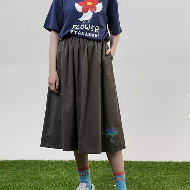 Женская плиссированная юбка до середины икры коричневая Повседневная