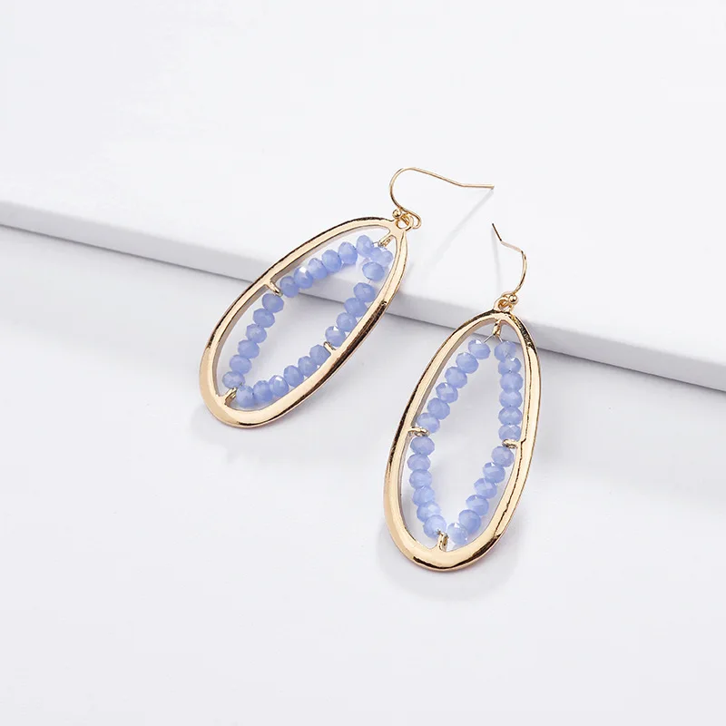 Женские серьги-подвески из металла с кристаллами и золотым покрытием | Украшения