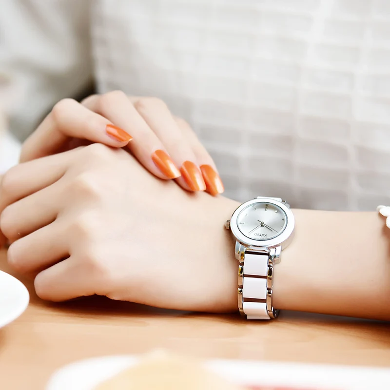 Женские часы Kimio кварцевые с имитацией керамики и ремешком из сплава золота