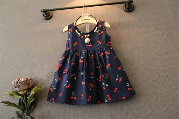 Детское хлопковое платье с бантом без рукавов трапециевидного силуэта | Детская