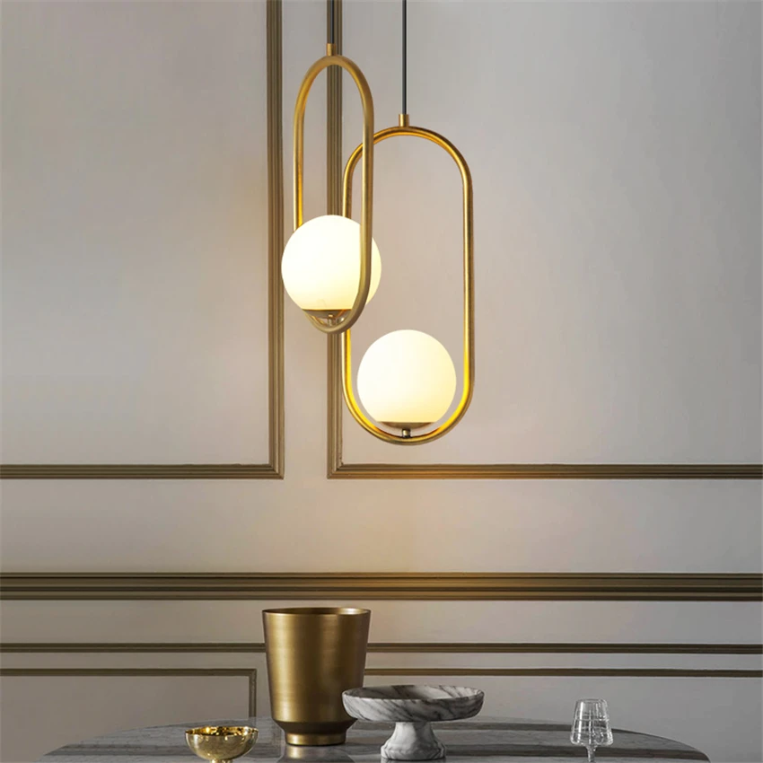 

Скандинавский современный эллиптический золотистый подвесной светильник, лампа в виде стеклянного шара для спальни, гостиной, ресторана, к...
