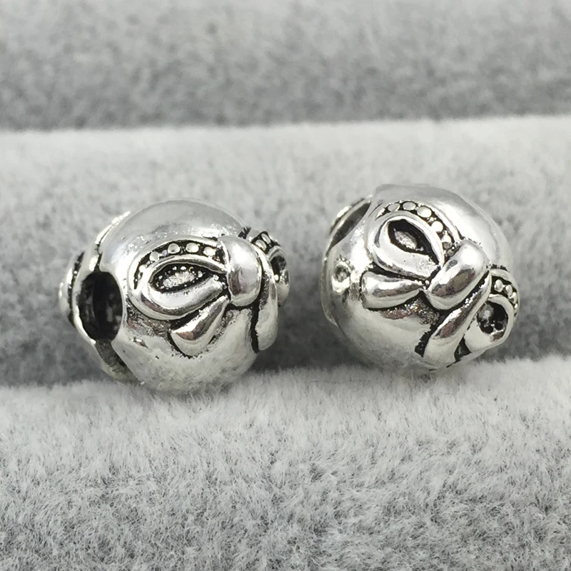 2 шт./лот лук золота с черным циферблатом новая версия покрытием клип Шарм