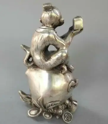 

Chinese Exquisite Tibetan Silver Copper Carving Monkey Sitting On Peach Crafts Statue