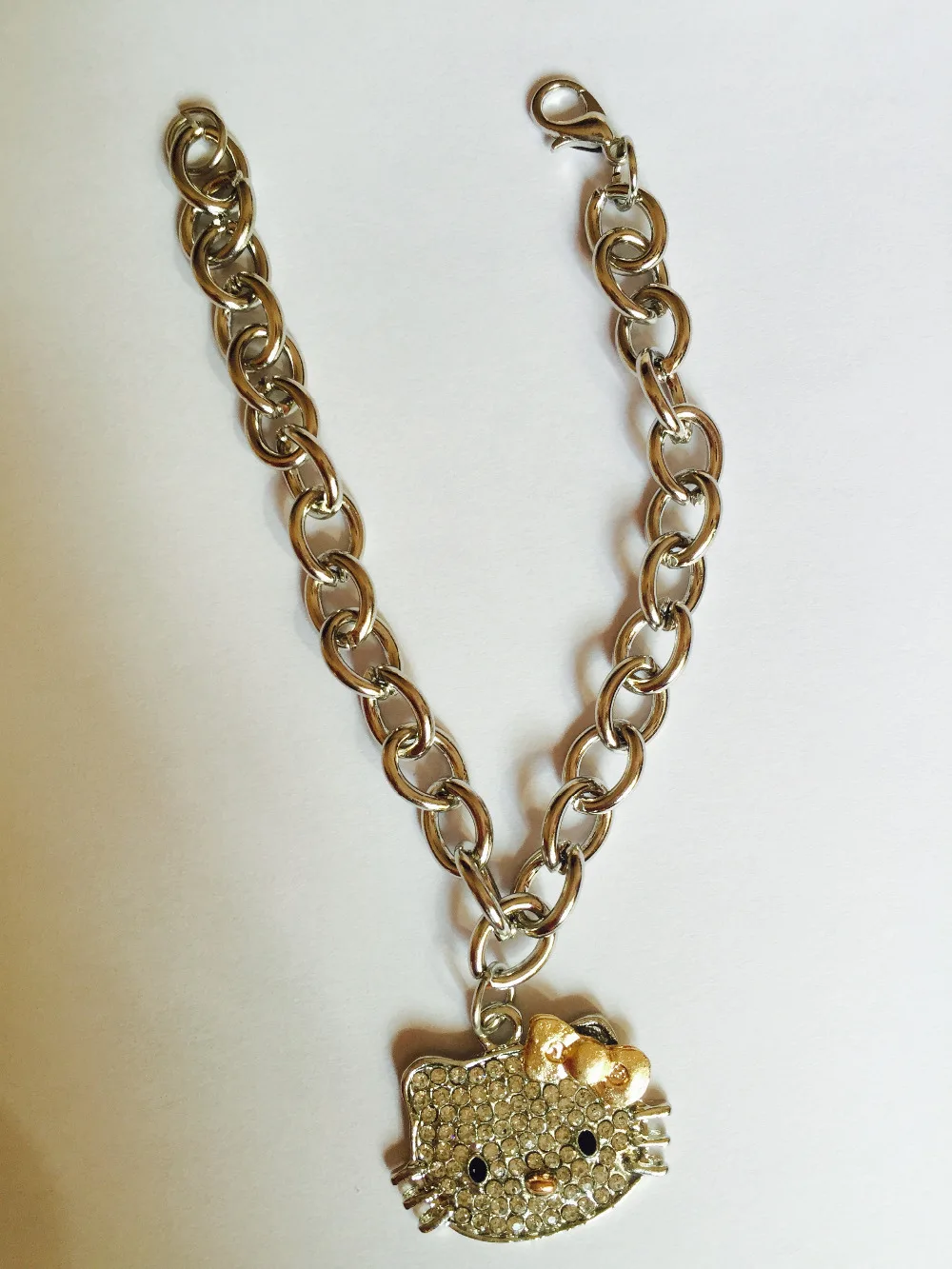 Бесплатная доставка оптовая продажа hello Китти браслет с золотым бантом 3 см