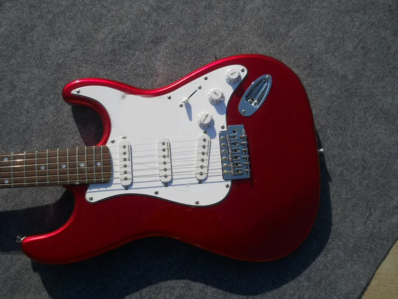 

Factory custom red guitar, SSS pickup, white shield. Free Delivery