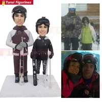 ski scene figurine for two character sketch and sculpture design custom sculpted facial from photos alpine skiing sport sculptur