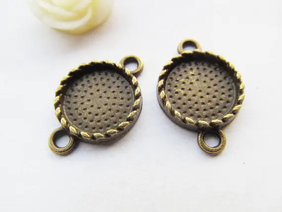 100 шт. античная серебряная/бронзовая Поворотная основа для рамки Очаровательная