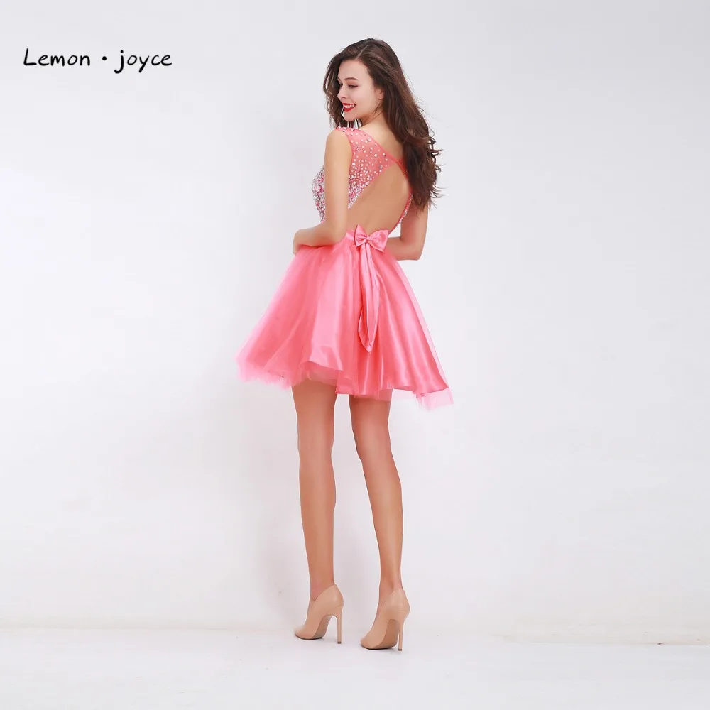 Розовые платья для девочек-подростков с глубоким вырезом без рукавов облегающие