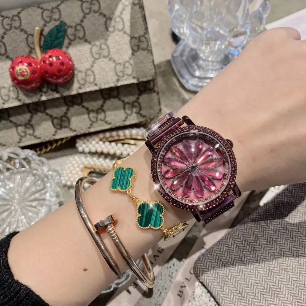 

Noble Purple Steel Milanese Watches Anti Fade Ultra Thin Bracelet Watch Rotating Daisy Flower Crystal Wristwatch Spinning Montre