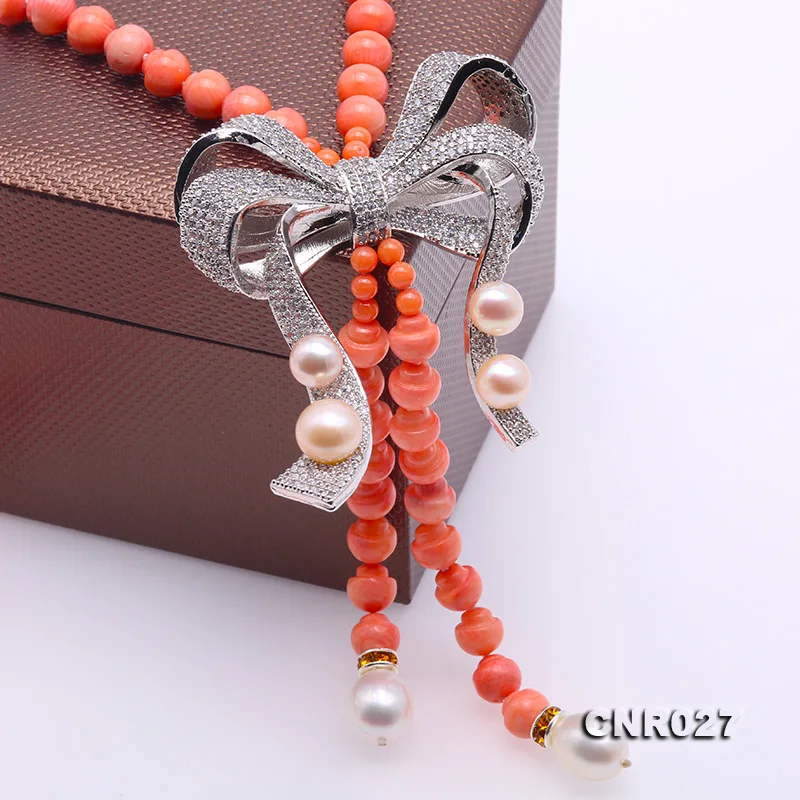 

JYX Beautiful 7-7.5mm Pink Coral Opera Necklace Irregular Beads Nature Gemstone Bow pendant Charming coral chocker 38"