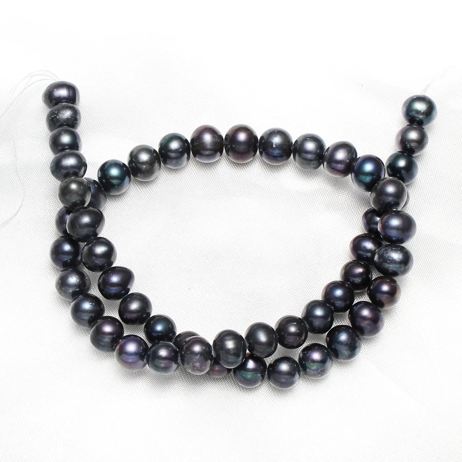 

Культивированный картофель пресноводного жемчуга бусины 8-9 мм прибл. 0,8 мм продано в приблизительно 15,1 дюйма прядь